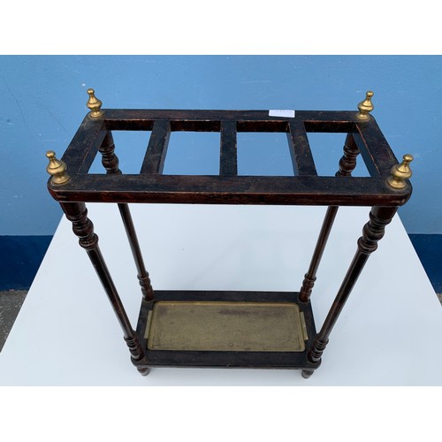 6 - A STICKSTAND WITH BRASS DRIP TRAY