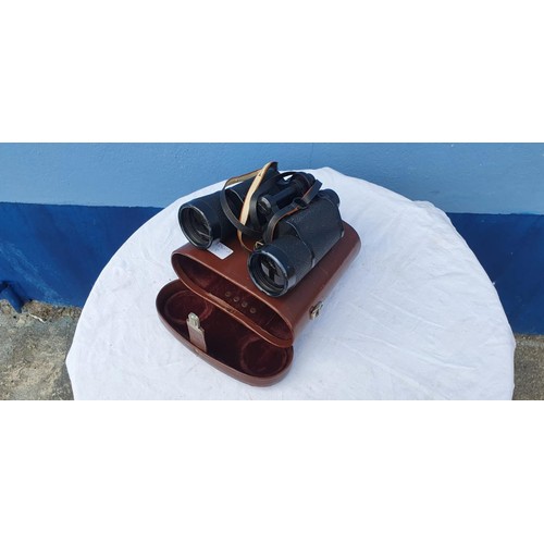 116 - A SET OF LEATHER CASED  BINOCULARS