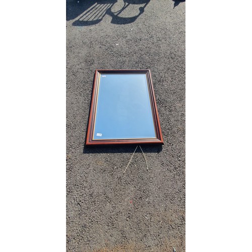 93 - MAHOGANY FRAMED BEVELLED EDGED MIRROR 34