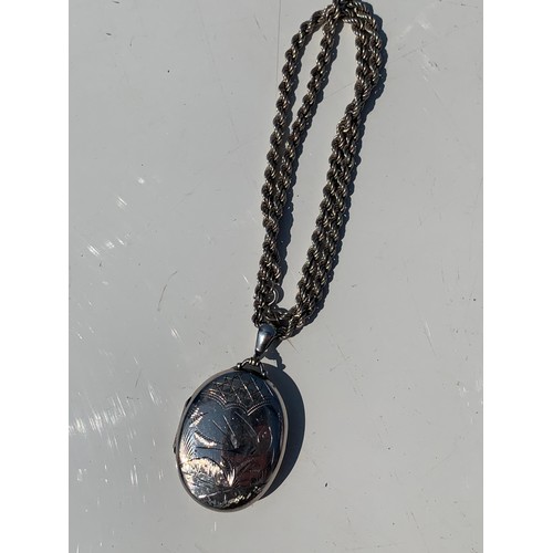 213 - LARGE SILVER LOCKET ON HEAVY ROPE CHAIN