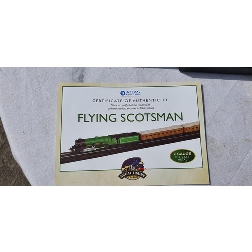 265 - A BOXED MINI DIE CAST MODEL OF THE FLYING SCOTSMAN