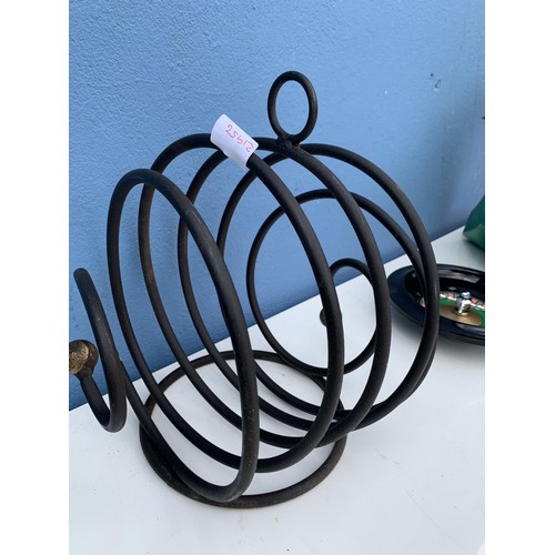 299 - CAST IRON MAG RACK