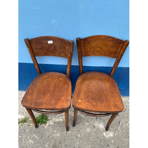 300 - A MATCHING PAIR OF BENTWOOD CHAIRS