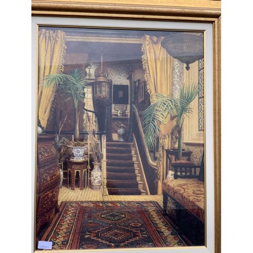 81 - A GILT FRAMED PRINT FRENCH HALL SCENE