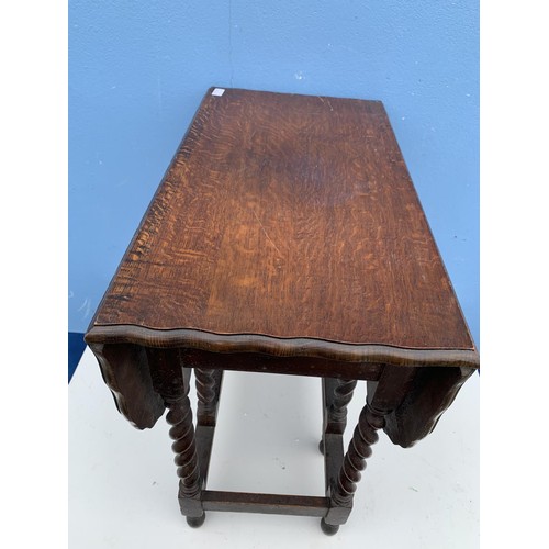 87 - A SOLID OAK BARLEY TWIST DROP LEAF TABLE