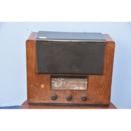 42 - A TEAK CASED VALVE RADIO