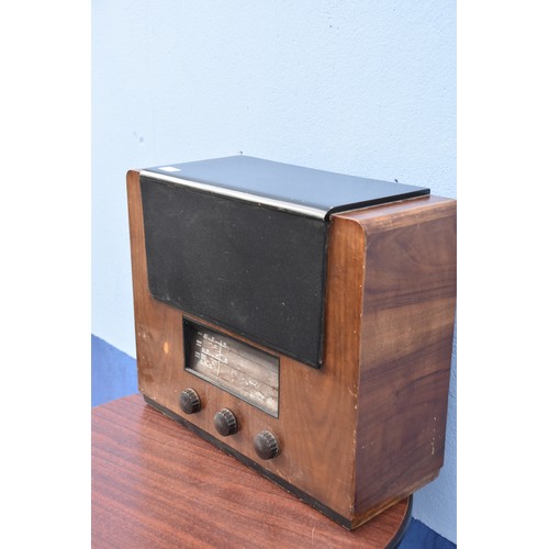 42 - A TEAK CASED VALVE RADIO