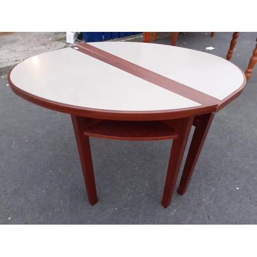 9 - PAIR OF HEAT RESISTANT SHAPED TABLES