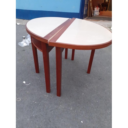 9 - PAIR OF HEAT RESISTANT SHAPED TABLES