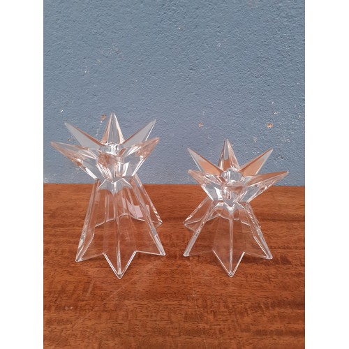 25 - A PAIR OF CRYSTAL CANDLE HOLDERS