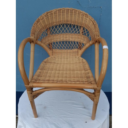 2 - A WICKER ARMCHAIR