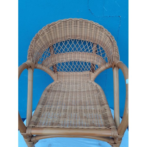 2 - A WICKER ARMCHAIR