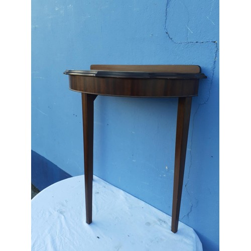 23 - A MAHOGANY HALFMOON HALL TABLE