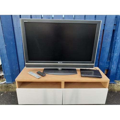 48 - OAK TV UNIT WITH SONY TV AND DVD PLAYER