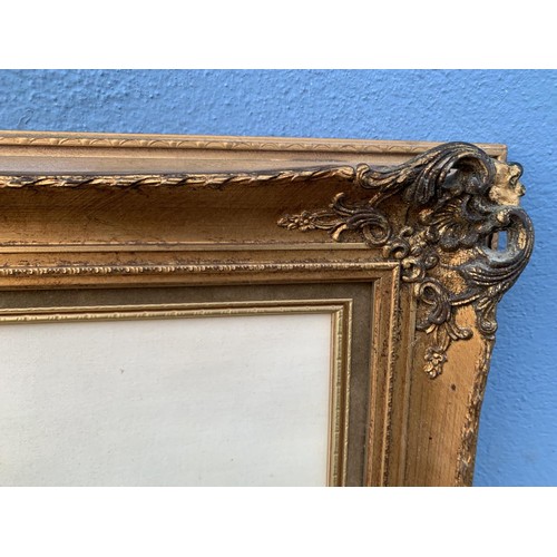 58 - A LARGE GILT FRAMED COACHING SCENE