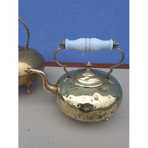 131 - 2 BRASS KETTLES 1 WITH AN OPALINE GLASS HANDLE