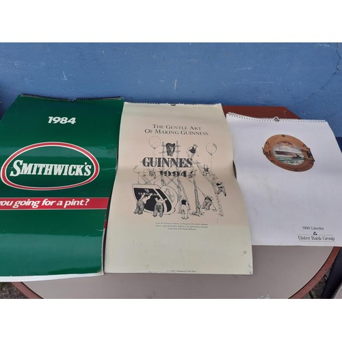 49 - LOT OF COLLECTABLE CALENDERS INCLUDING SMITHWICKS, GUINNESS ETC