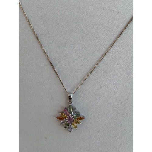 220 - A SILVER MULTI GEM SET PENDANT ON SILVER CHAIN