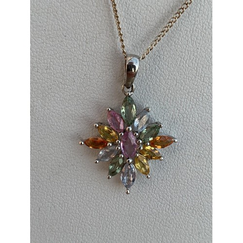 220 - A SILVER MULTI GEM SET PENDANT ON SILVER CHAIN