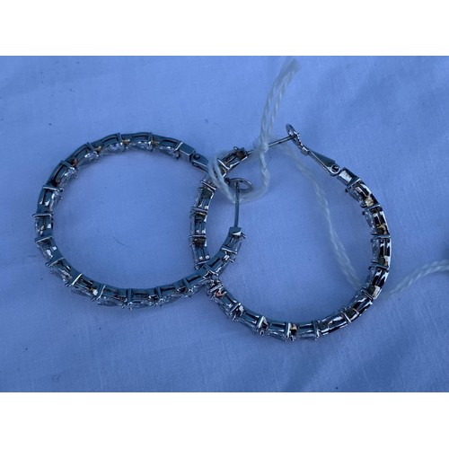 221 - LARGE SILVER HOOP EARRINGS SET WITH PEAR SHAPED STONES