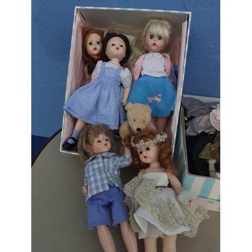 27 - A LOT OF MADAME ALEXANDER DOLLS AND ACCESSORIES