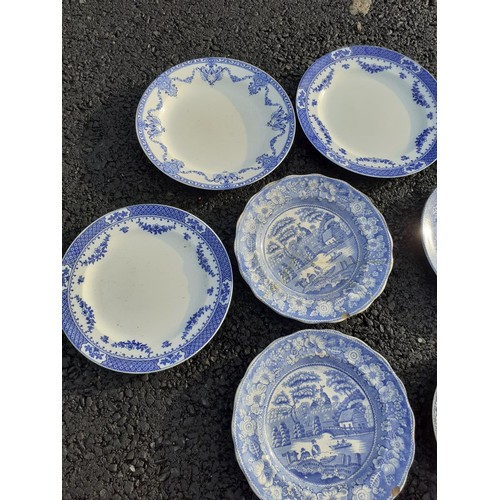 42 - A COLLECTION OF OLD BLUE AND WHITE PLATES