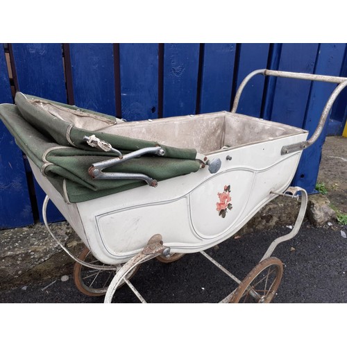 158 - AN OLD TINPLATE DOLLS PRAM REQUIRES 2 BOLTS