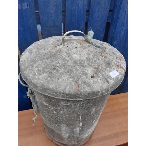 160 - AN OLD GALVANISED DUST BIN AND LID