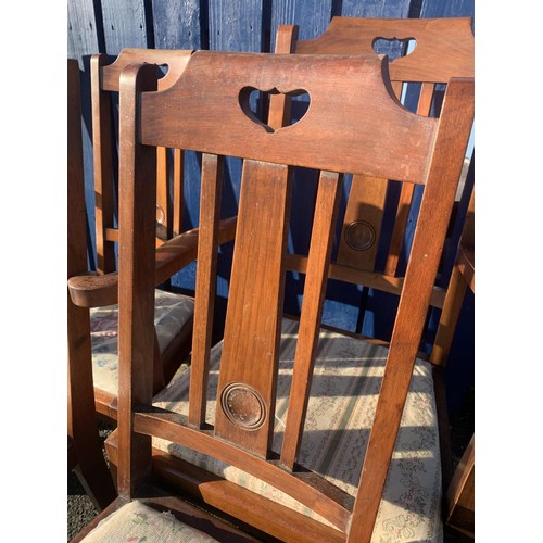 167 - A SET OF 6 MAHOGANY IN ARTS AND CRAFTS STYLE ON TAPERING LEG