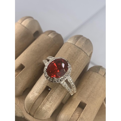 196 - A TWIN BAND SILVER RING SET WITH RED STONE