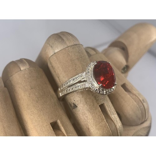 196 - A TWIN BAND SILVER RING SET WITH RED STONE