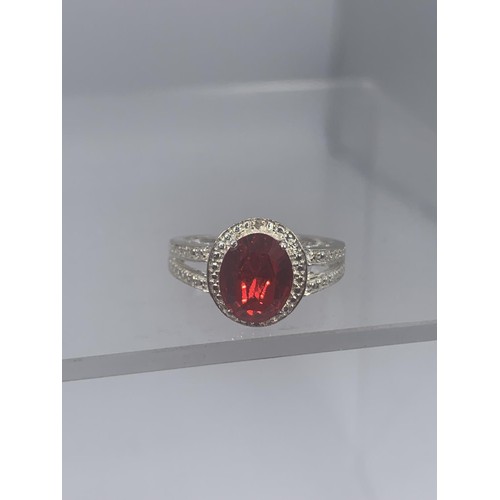 196 - A TWIN BAND SILVER RING SET WITH RED STONE