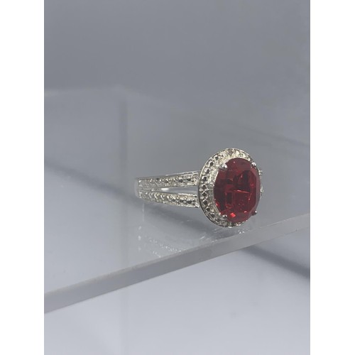 196 - A TWIN BAND SILVER RING SET WITH RED STONE