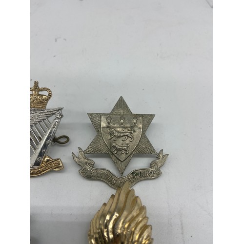 198 - 4 ARMY CAP BADGE