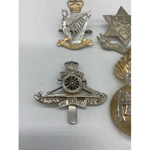 198 - 4 ARMY CAP BADGE