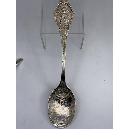 215 - VERY ORNATE SILVER SPOON WITH A CHERUB TO HANDLE 78.6G