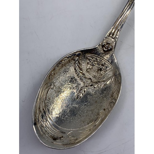 215 - VERY ORNATE SILVER SPOON WITH A CHERUB TO HANDLE 78.6G