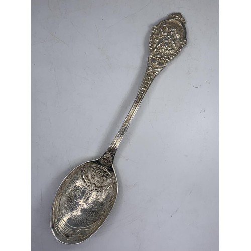 215 - VERY ORNATE SILVER SPOON WITH A CHERUB TO HANDLE 78.6G