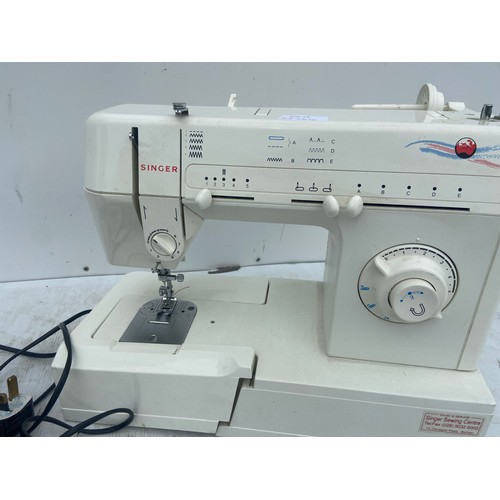 18 - A SINGER SEWING MACHINE