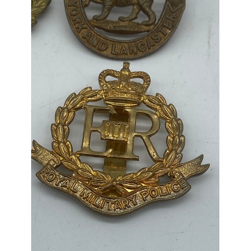 284 - 4 ARMY CAP BADGE