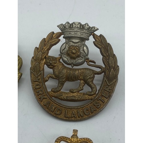 284 - 4 ARMY CAP BADGE