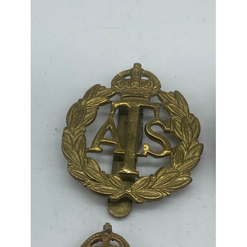 284 - 4 ARMY CAP BADGE