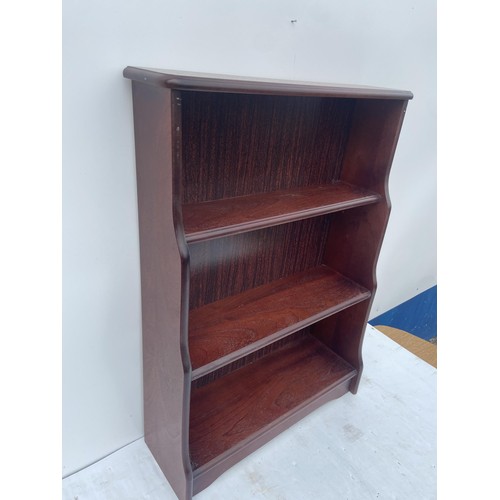 63 - A SET OF MAHOGANY BOOKSHELVES 23X32