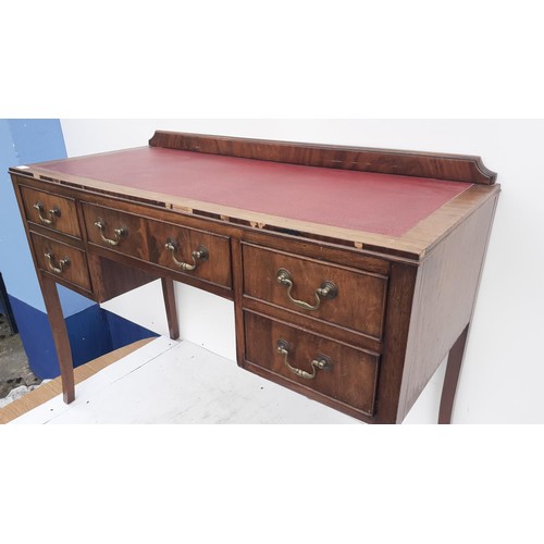 97 - A LEATHER TOPPED WRITING DESK ON CABRIOLE LEG