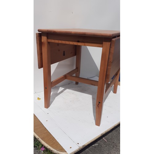 103 - A NARROW PINE DROP LEAF TABLE