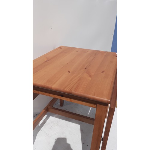 103 - A NARROW PINE DROP LEAF TABLE