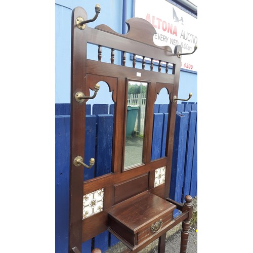 118 - A TILED BACK EDWARDIAN MAHOGANY HALLSTAND WITH DRAWER AND TRAYS 36X75