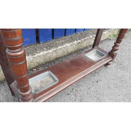 118 - A TILED BACK EDWARDIAN MAHOGANY HALLSTAND WITH DRAWER AND TRAYS 36X75