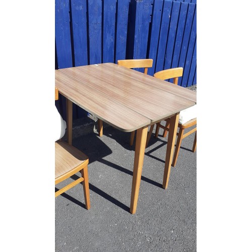 137 - A NARROW DROP LEAF TABLE AND 4 CHAIRS