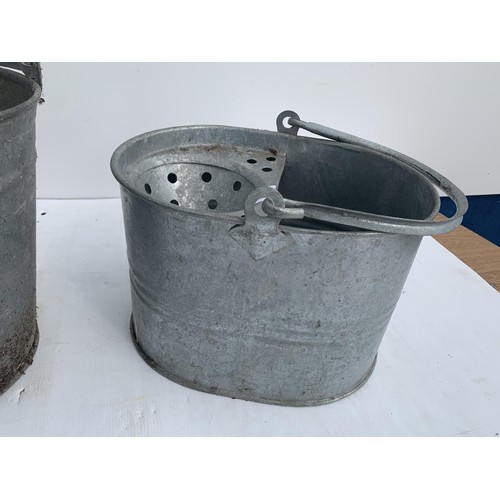 126 - A GALVANISED MOP BUCKET AND BUCKET